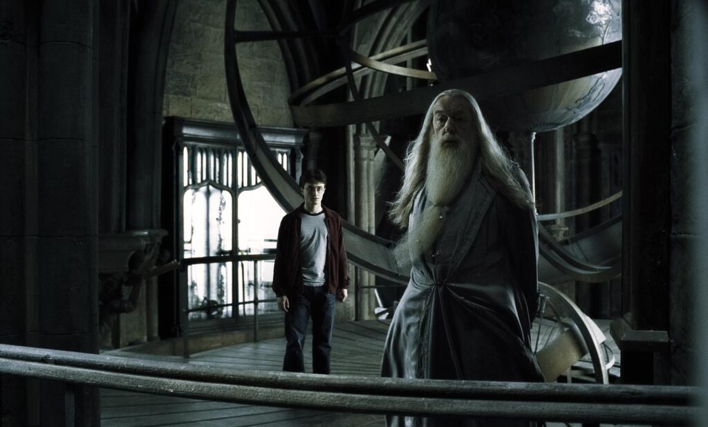 Harry and Dumbledore standing on the astronomy tower