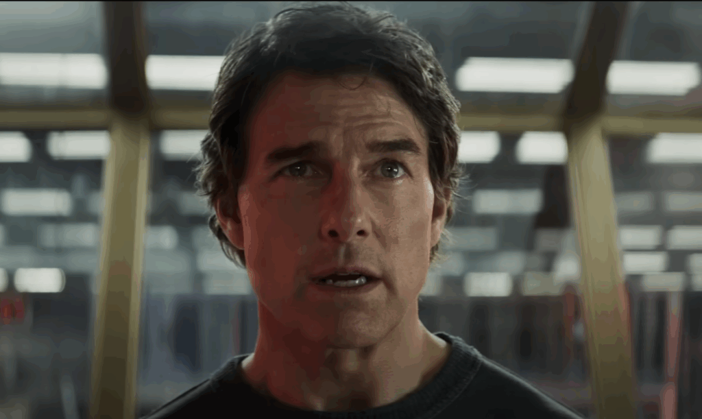 Will Smith Reignites His Tom Cruise Rivalry With Paramount Deal to Make Hollywood Comeback 1 Tom Cruise wearing a black T-shirt in Mission: Impossible - The Final Reckoning.