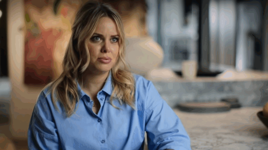 A woman in a blue shirt