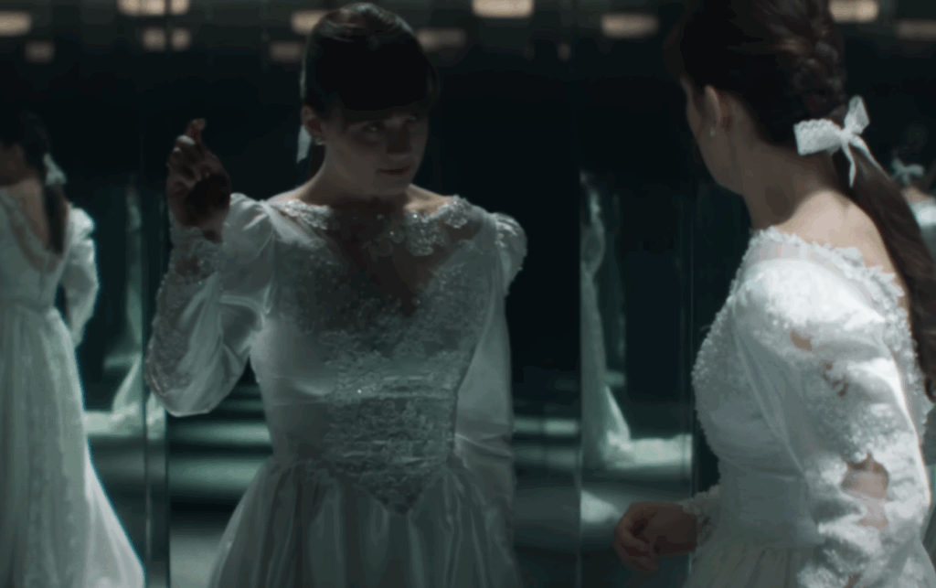 The mirror demon knocking on the mirror to scare Judy 