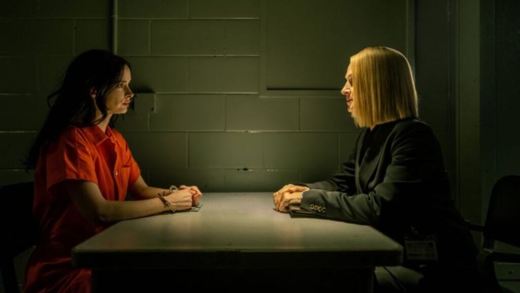 Lady Vengeance talking with her lawyer