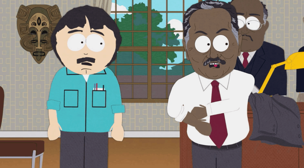 Randy Marsh, in a light blue shirt, is standing next to a black man in a white shirt and red tie, who looks angry.