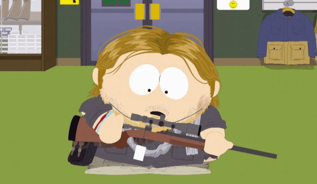Cartman with shaggy blonde hair and a beard is shown holding a large sniper rifle.