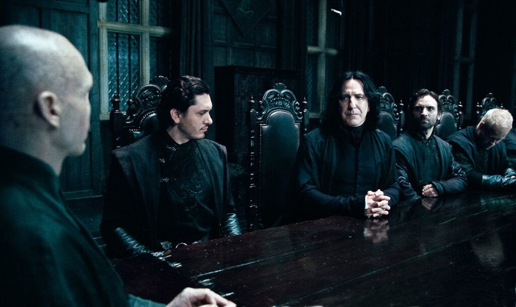 Every Death Eater with Voldemort on a table.