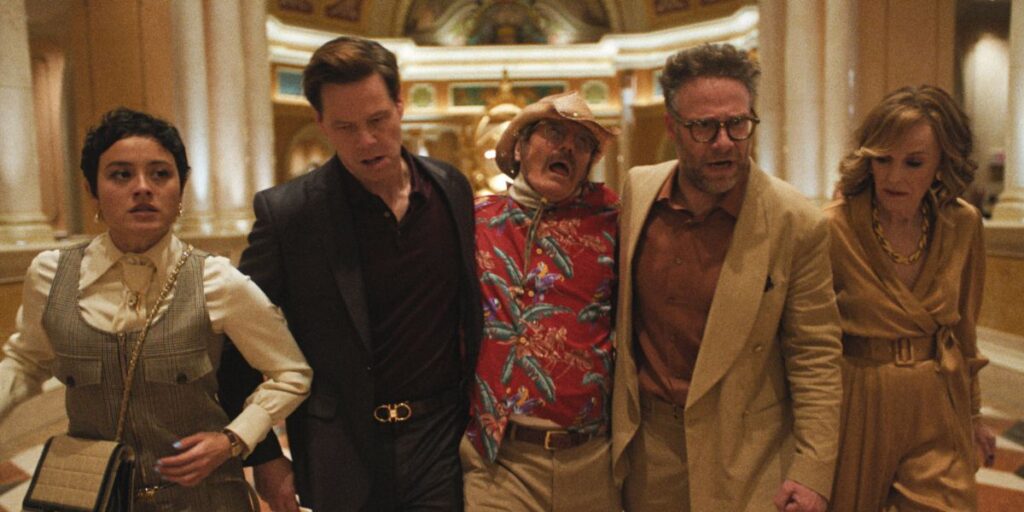 Chase Sui Wonders, Ike Barinholtz, Bryan Cranston, Seth Rogen and Catherine O’Hara looking tipsy and holding each other side-by-side in The Studio