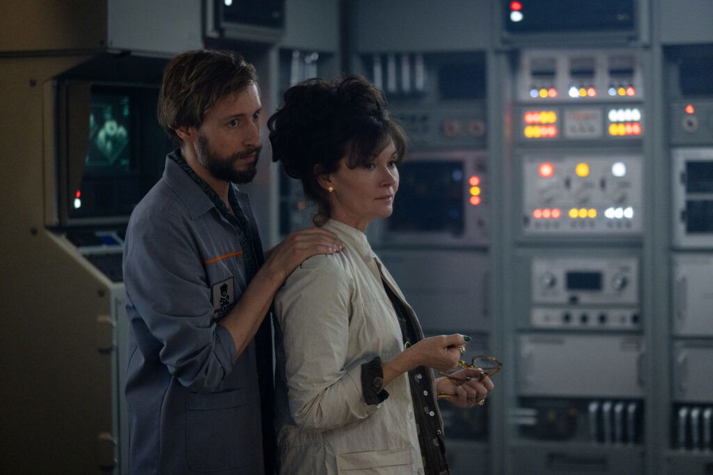 FX's Alien: Earth -- Pictured: (l-r) David Rysdahl as Arthur, Essie Davis as Dame Sylvia. CR: Patrick Brown/FX