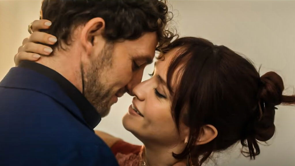 Two people about to kiss