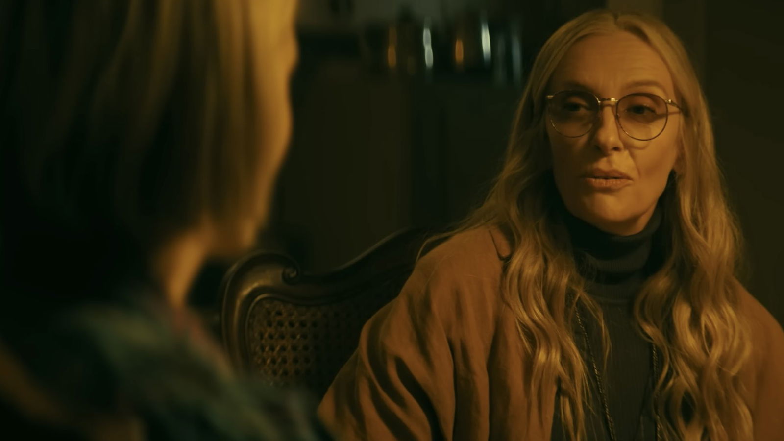 A older woman has a conversation with a younger woman