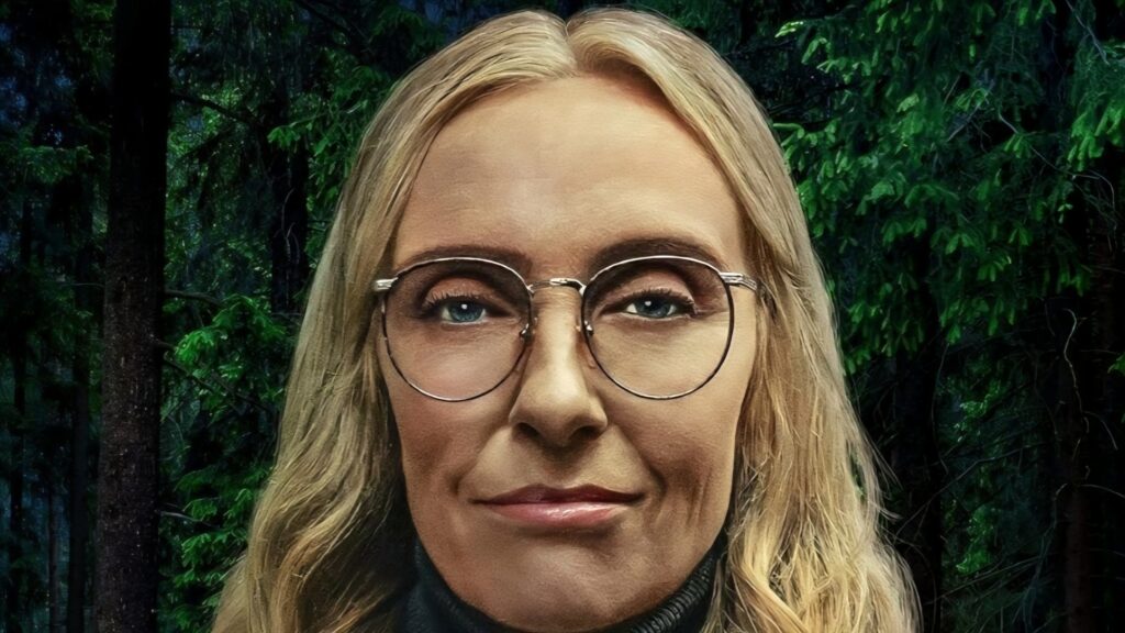 A woman wears glasses
