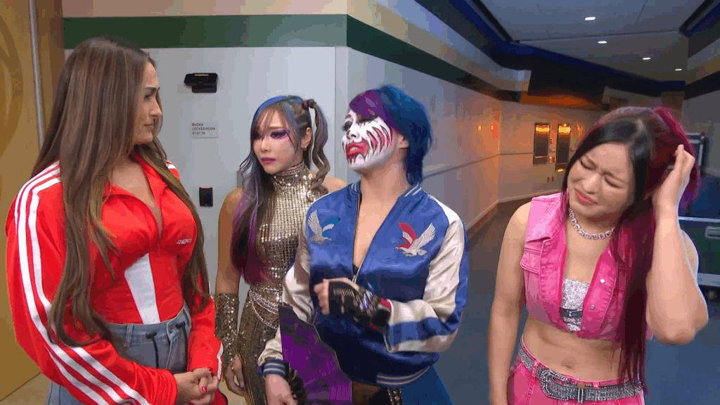 Nikki Bella and Asuka engage in a heated conversation