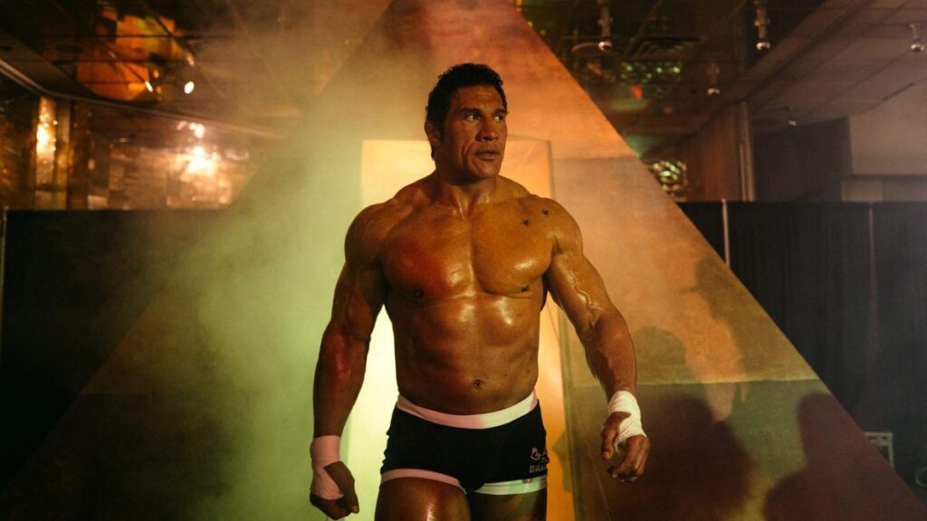 The Rock walking into the fighting arena as Mark Kerr