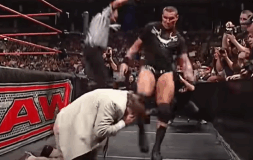 Randy Orton about to punt kick John Cena's father