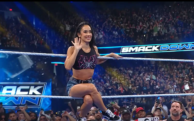 AJ Lee waving at Becky Lynch after making her return on SmackDown (September 5, 2025)