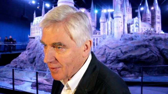 Stuart Craig speaking with interviewers during Harry Potter studio tour.