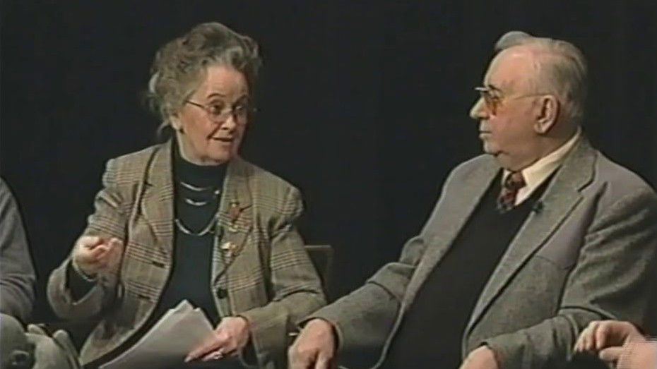 Real-life photograph of Ed and Lorraine Warren, the actual paranormal investigators who inspired The Conjuring franchise, sitting together during a television interview