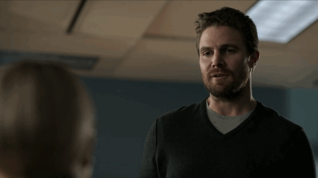 Oliver looking at someone in arrow