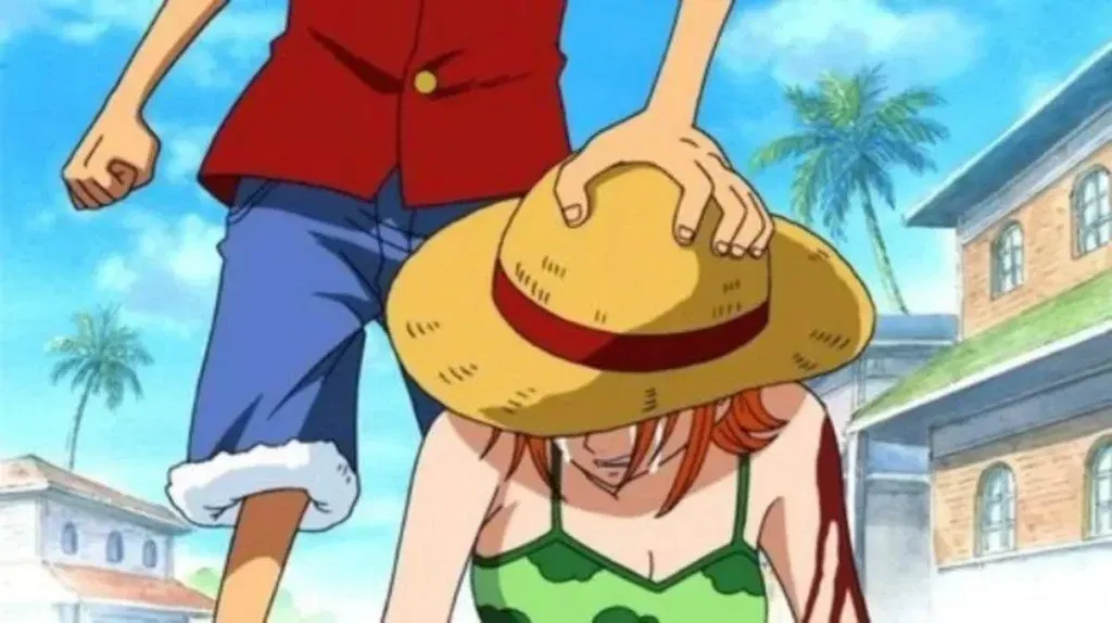 Luffy giving his hat to Nami