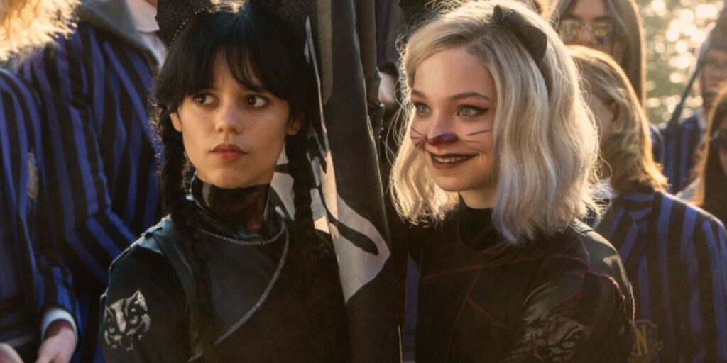 Enid Sinclair and Wednesday Addams in black outfits in Wednesday season 1