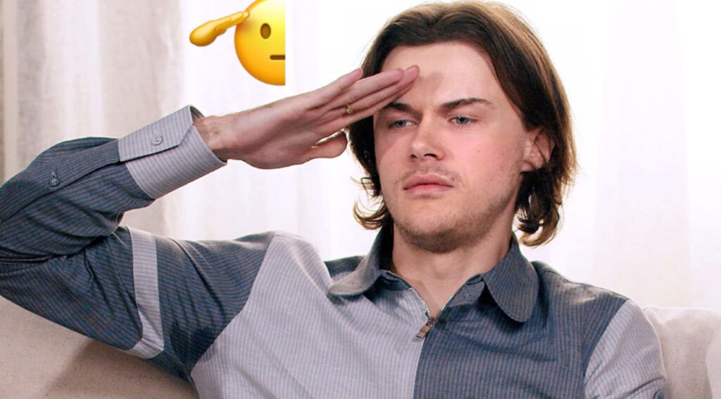 Close-up of Briney making a subtle expression as he talks about using the salute emoji.
