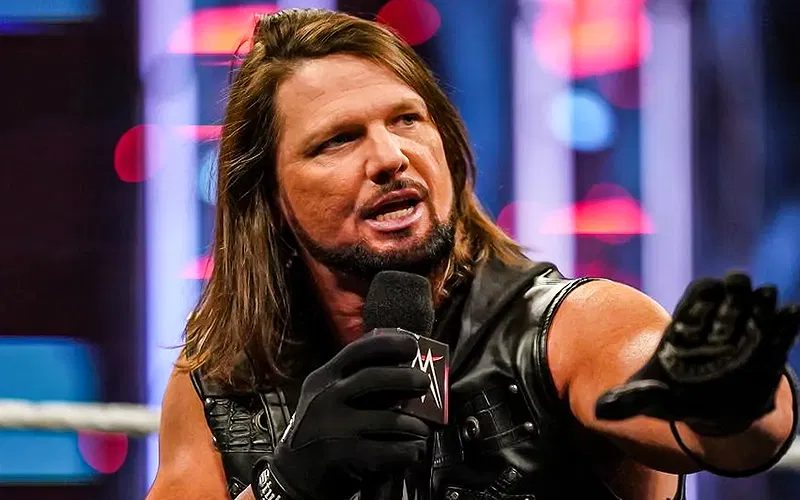 did aj styles take a cheap shot at triple h?