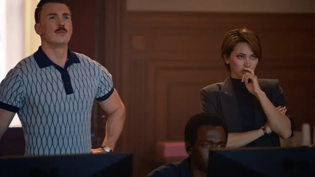 Chris Evans and Jessica Henwick in a still from The Gray Man