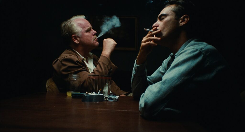 A still from The Master (2012), featuring Joaquin Phoenix and Philip Seymour Hoffman.