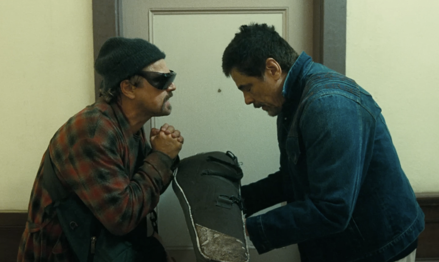 Leonardo DiCaprio, in a beanie, and sunglasses. 