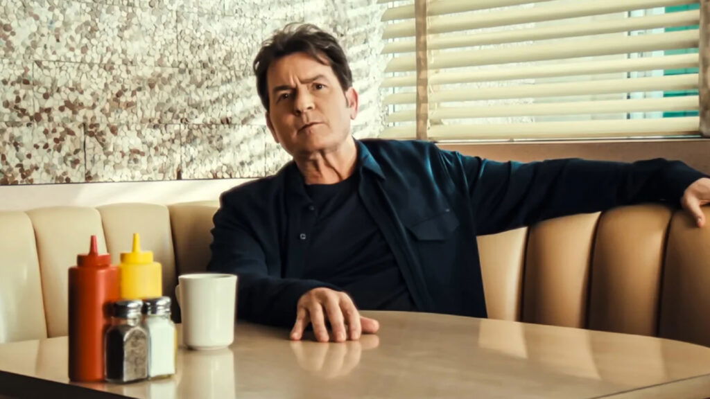 Charlie Sheen, in a cafe setting, in the documentary, aka Charlie Sheen