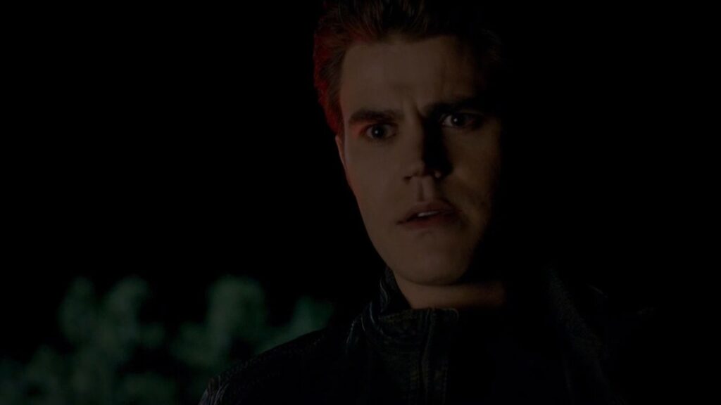 Paul Wesley as Silas with dark hair in a dark setting, photographed dramatically with strong shadows across his face.