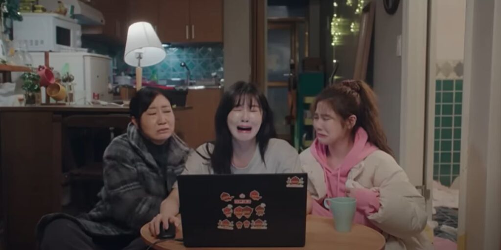 3 characters sit around a laptop and cry in a comedic moment in To The Moon