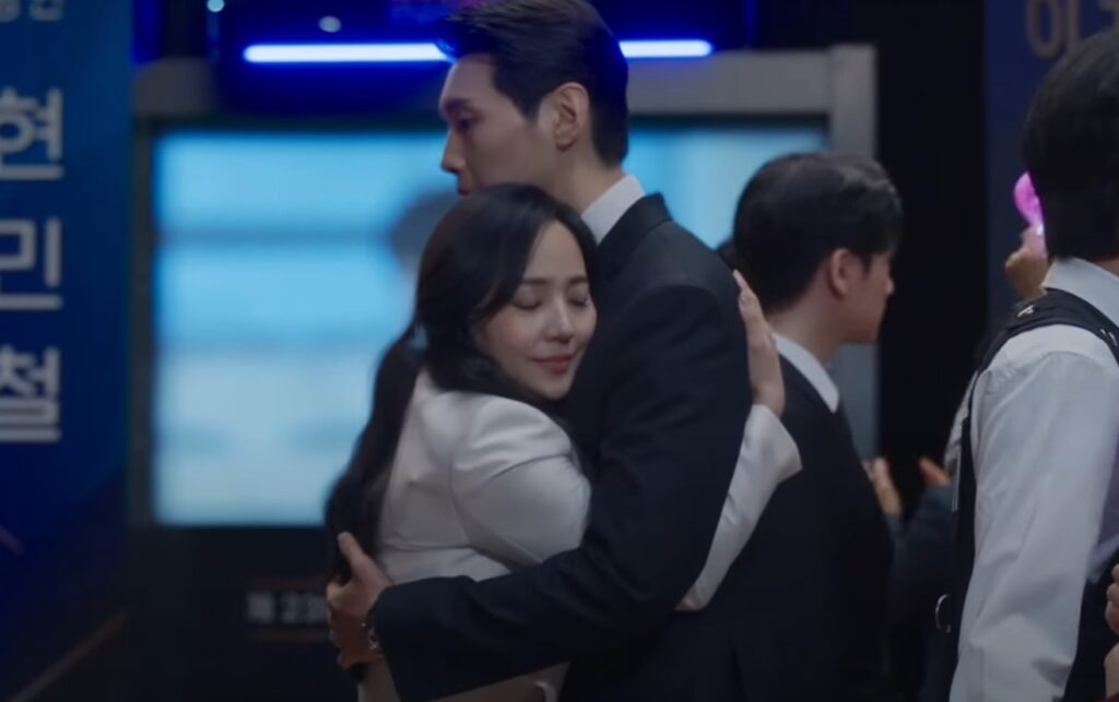 Two people hugging