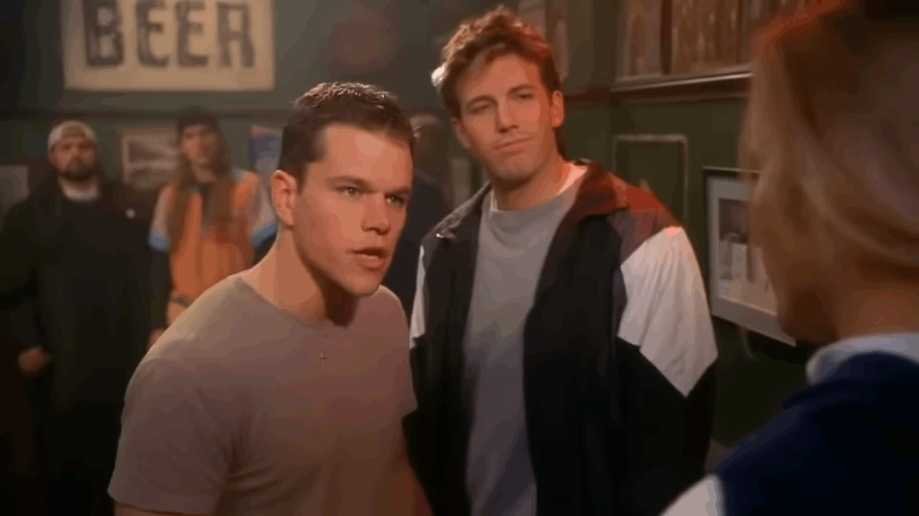 Matt Damon talking something while Ben Affleck smiles in the backdrop in Jay and Silent Bob Strike Back