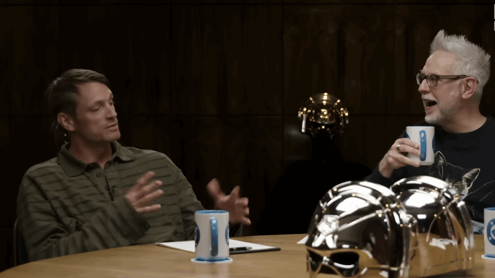 Joel Kinnaman and James Gunn in a still from the podcast.