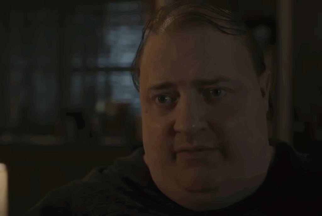 A close-up shot of Brendan Fraser wearing prosthetics. 