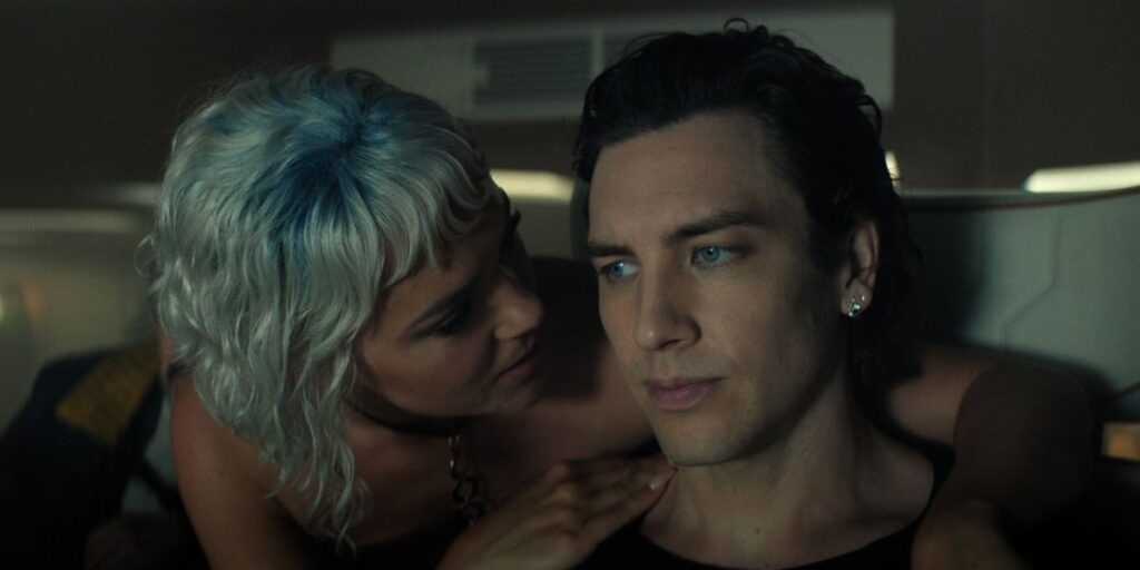Synnøve Karlsen holding Cody Fern in Foundation season 3