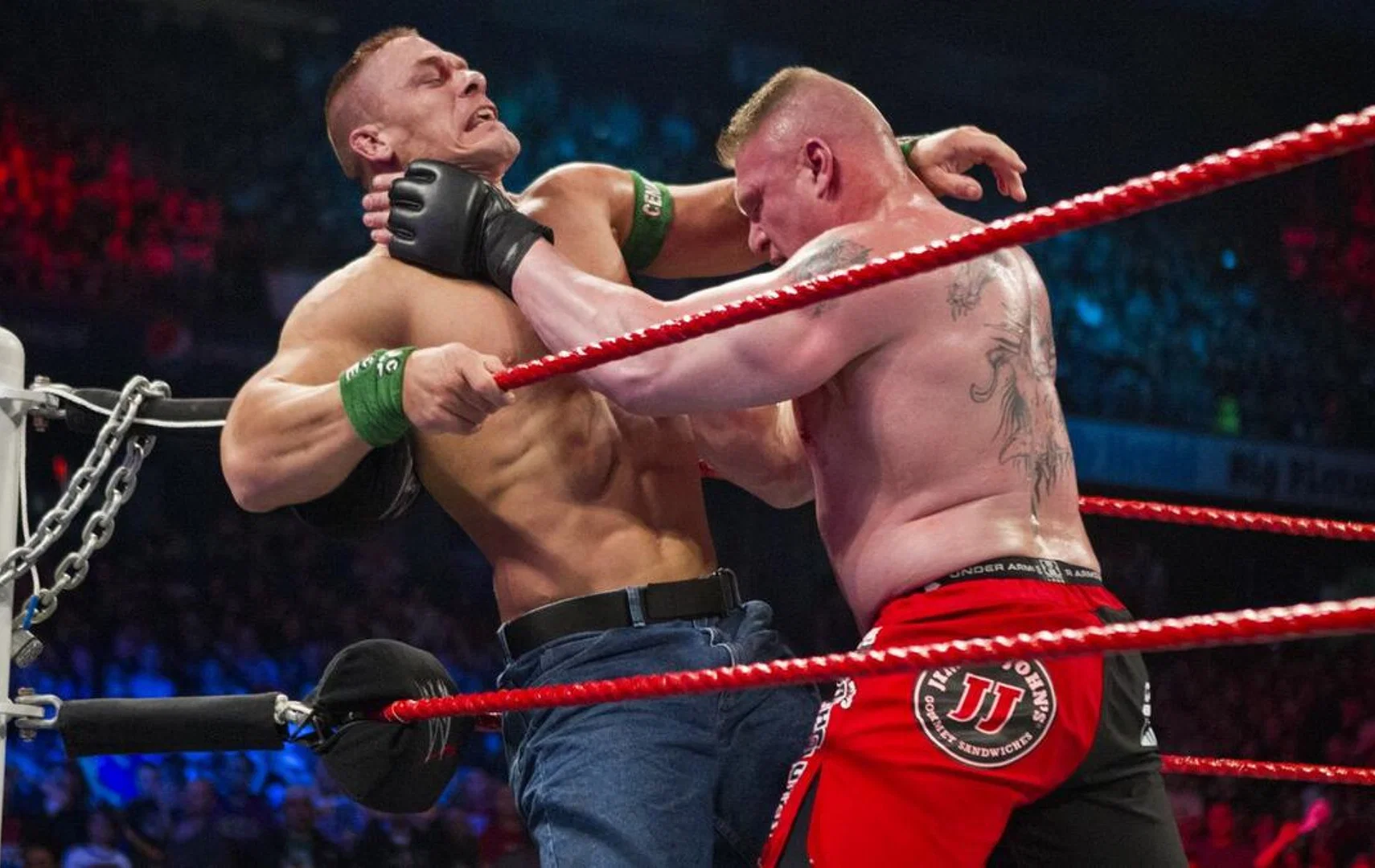 Brock Lesnar beating up John Cena during their match