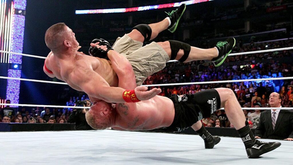 Brock Lesnar hitting a suplex on John Cena