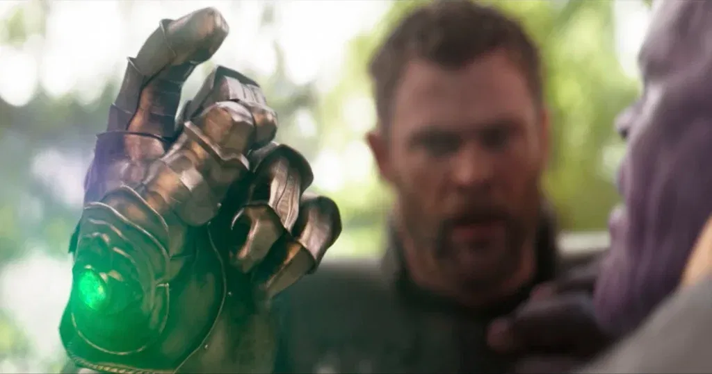 Thanos snaps in front of Thor
