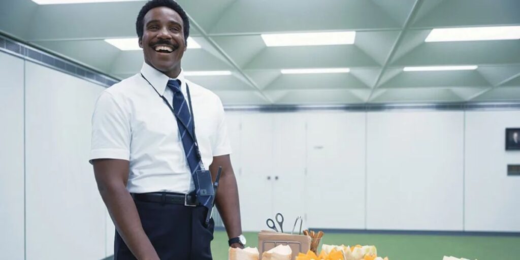 tramell tillman similing in  the severance