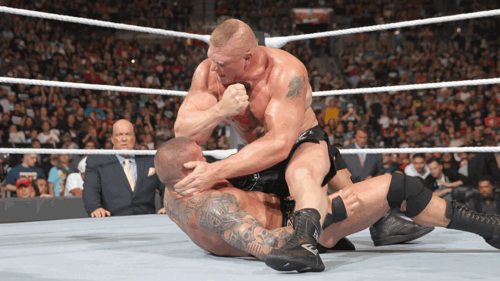 Brock Lesnar hitting Randy Orton with his elbows