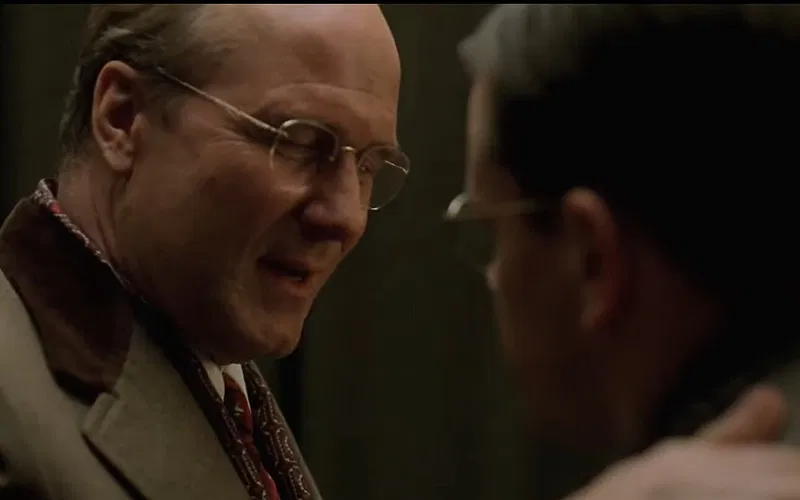 A conversation between characters within the intelligence community.