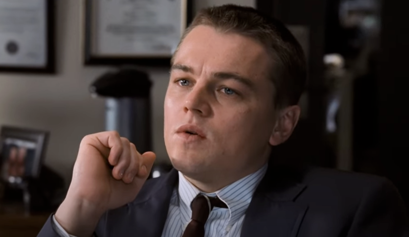 Leonardo DiCaprio wearing a suit and tie in The Departed. 