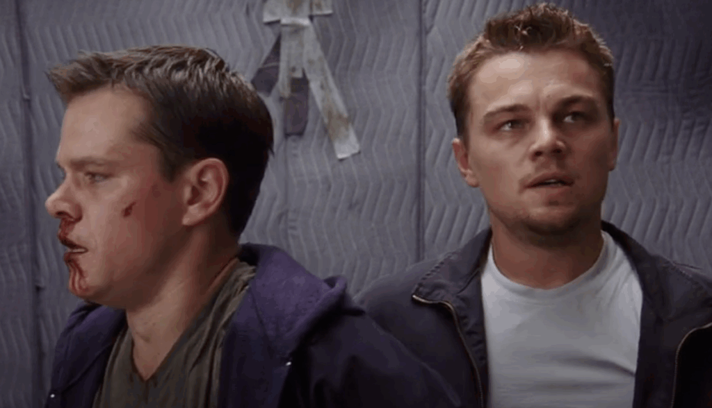 Leonardo DiCaprio and Matt Damon in an elevator in The Departed. 