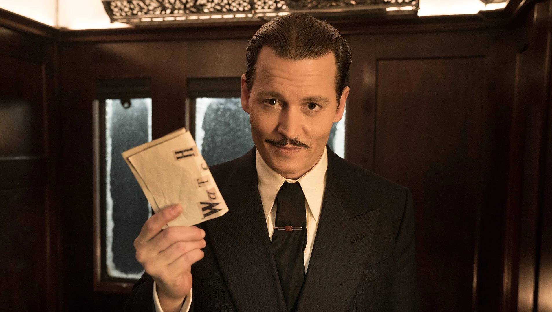 Johnny Depp stars in Twentieth Century Fox’s “Murder on the Orient Express.”
