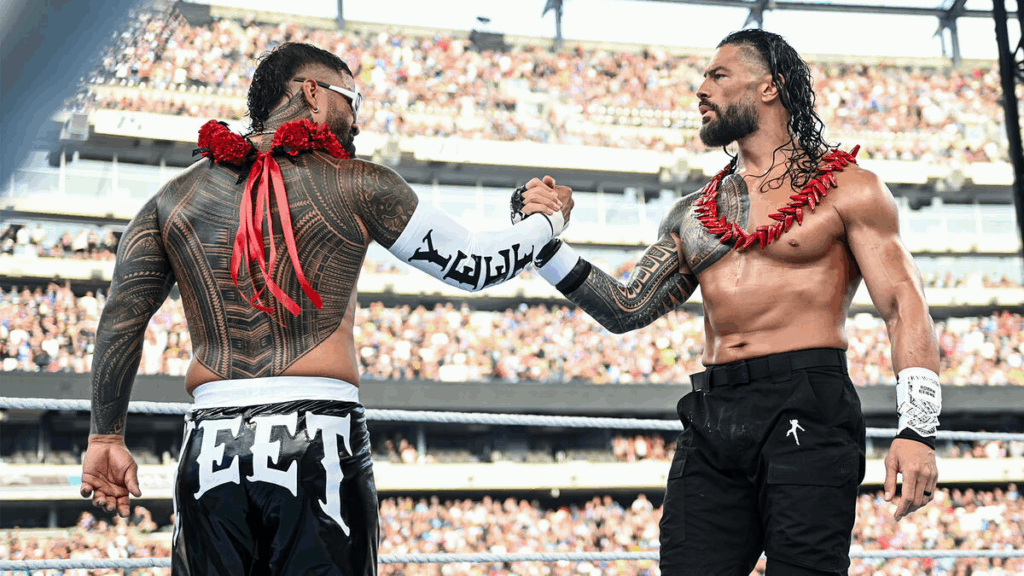 Roman Reigns and Jey Uso shaking hands during their WWE match