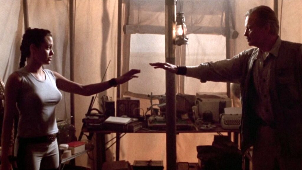 Jon Voight and Angelina Jolie in Lara Croft: Tomb Raider as Lord Richard Croft and Lara Croft 