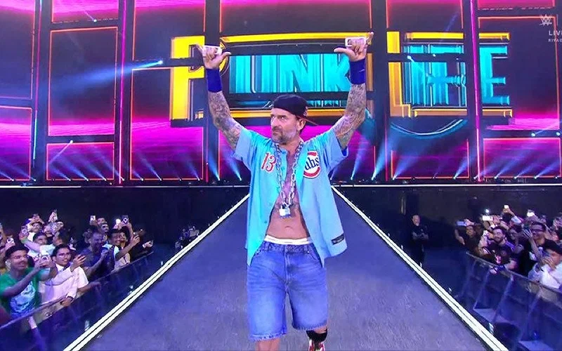 CM Punk dressed as Doctor of Thuganomics, and making his way to the WWE ring