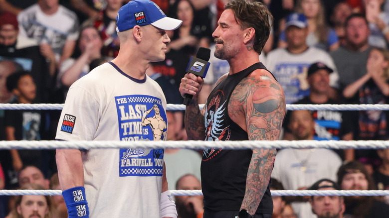 CM Punk and John Cena in a promo face-off during a WWE SmackDown segment