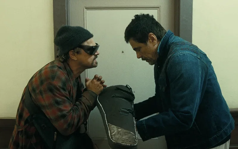 Leonardo DiCaprio's Bob, pleading Benicio del Toro's sensei to join him in One Battle After Another.