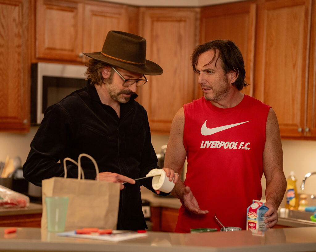 Will Arnett as Alex Novak and Bradley Cooper as Arnie in Is This Thing On?